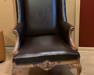 Fairfield black leather wing back chair with carved wood detailing and ball and claw feet. Photo 1 of 3. 