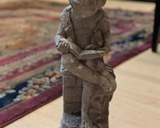 Concrete garden statue. 