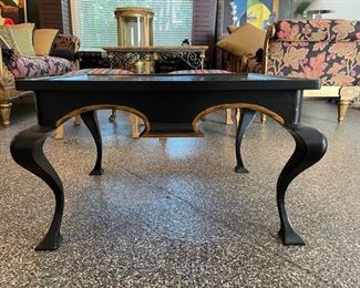 Ebony deAurora tea table with gold painted trim. Measures 30" D x 36" W x 22" H. Photo 1 of 2. 