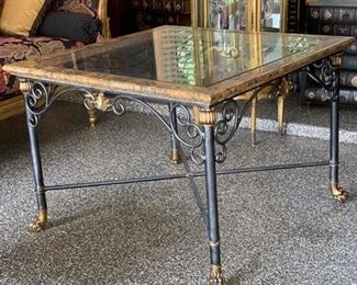 Iron scroll table with claw foot feet and glass top. Photo 1 of 2. 
