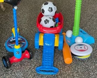 Plastic toys including Thomas scooter. 