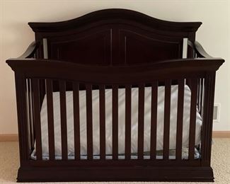 Convertible crib. Converts to full bed. 