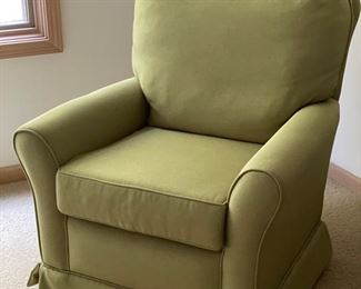 Upholstered green rocker club chair. 