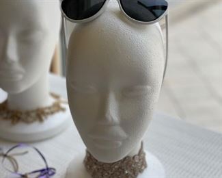Costume jewelry and designer sunglasses.