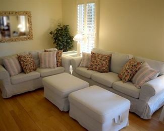 living room furniture with a couple sets of slipcovers to change the look!