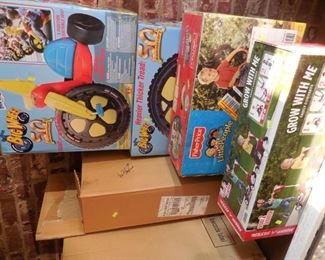 Children's vehicles still in boxes