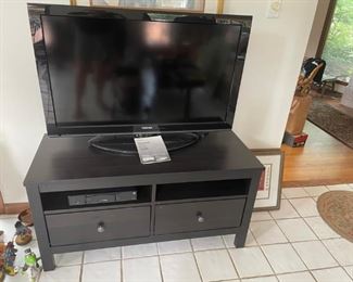 LARGE FLAT SCREEN TV AND LOW BLACK TV STAND