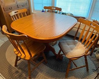 Dining table and 4 chairs with two leaves