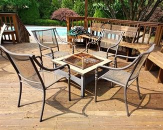 Four (4) patio chairs and fire pit