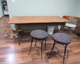 Vintage wooden table $150. 2 swivel top stools $25. each