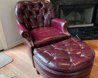 Burgandy leather tufted arm chair and ottoman, 35"H x 31"W x 33"D,  $395