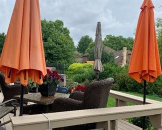 10’ open x 8’6”H Outdoor umbrella Gray  $35
8’ open x 8’6”h faded orange outdoor Umbrella $20