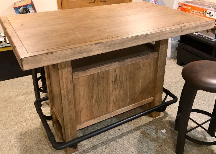 60w x 38d Macy’s Wood bar with foot rails 
Open shelf between bar top & base
$350
