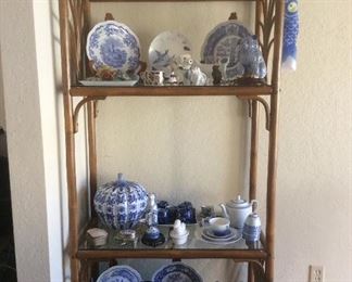Rattan etagere with blue and white asian pieces