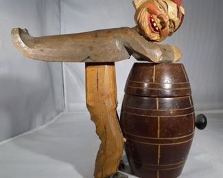 ANRI Man On Barrel Wood Carving