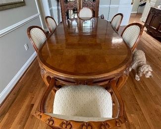 Century dining room table with 8 matching chairs and 2 leaves