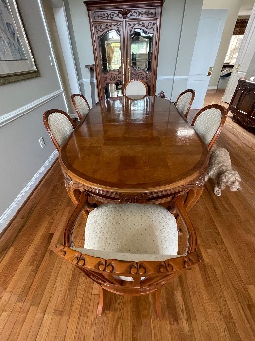 Century dining room table with 8 matching chairs and 2 leaves