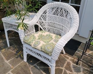 Open weave chair and side table. Chair is 35" high x 29" wide x 22" deep. 