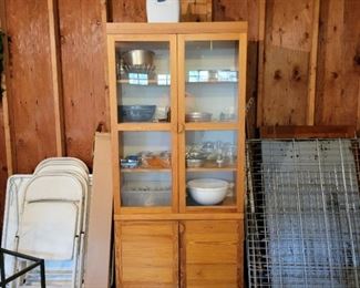 Glass front cabinet (in garage) - 75" high x 38" wide x 17" deep