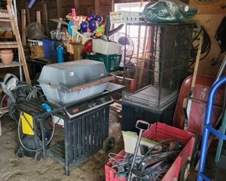 Red wagon, grill, shelf unit...located in the shed