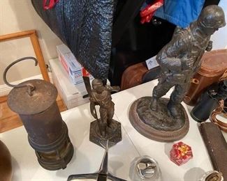 Antique miner lamp, bronze figures 