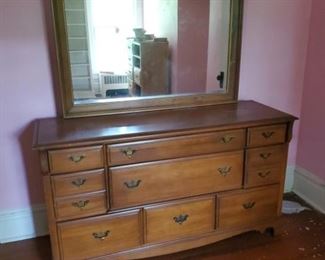 Early American maple 9 drawer dresser with morror
