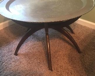 Highly coveted Moroccan brass tray table with spider base in wood and brass