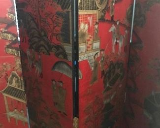 Large four panel Asian screen in red and black lacquer 