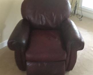 Brown soft  leather reclining chair.