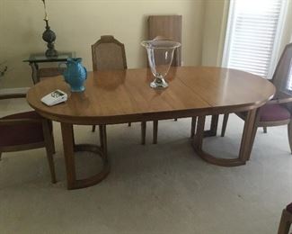 Well built contemporary  dining room table with extra leaf and pad. 44”x82”. Approximately 29” tall. 