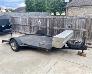 Motorcycle Trailer 
Bullet liner with two bolted in wheel chocks and aluminum diamond plate travel box.
Built in slide in ramps.
143" long (inside frame) x 76" wide 
LED Lights with RV Plug and bulldog hitch and jack.
$1,100