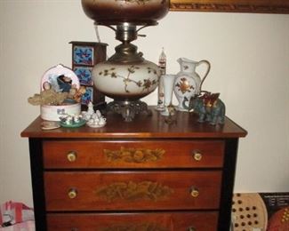Lamp on four drawer chest