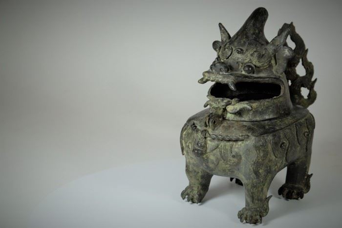 A Chinese Bronze Buddhist"Lu Duan"Censer.17/18th ;In the form of a snarling "LuDuan" with its tail flicked up,Mouth opened, morale fierce; "Song Shu·Fu Ruizhixia": "Lu Duan travels for thousands of miles a day, and also knows the words of the four barbarians, the Holy Lord is on the throne, and he knows that he is far away from the outside, and he comes in the book." There is a pair on both sides of the Hall of Supreme Harmony in the Forbidden City. It is guarded by the side with a lunar end. It shows that the emperor knows the affairs of the world because he is on the throne. . The family is also integrated, and the world is also looking to the world to learn.Measures:(19 x16 x11cm; total 3.74lb weight)