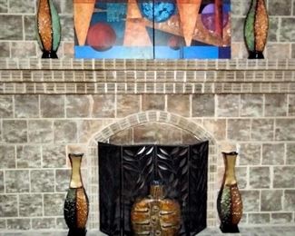 Great artwork enhancing brick fireplace.
