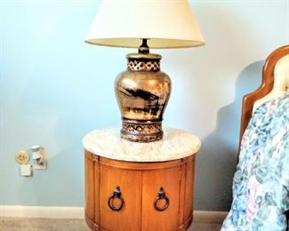 Beautiful paired marble-top neoclassical barrel-shaped night stands.