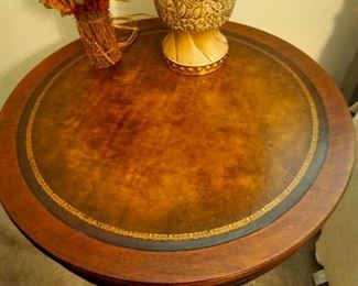 Featuring leather top of Drum Table.