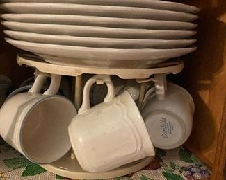 Lots of dishes, assorted glassware, and kitchen supplies