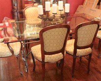 Glass Dining Table with Metal Base and 6 Bergere Chairs