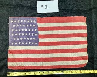 $350
46-star flag circa 1908-1912, after Oklahoma became a state. Screen printed on silk, top selvedge edge, machine stitched along side and bottom edges.