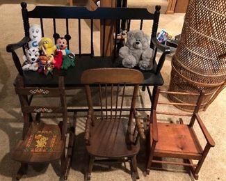 Three rocking chairs for children.