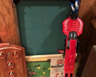 Pool table for children; toss-the-ring game.