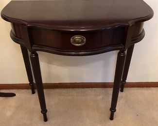 Single-drawer accent table.