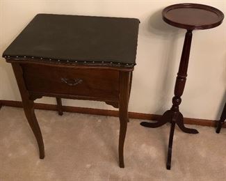 Plant stand by The Bombay Company (right); sewing machine cabinet (left).