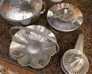 Selection of hammered aluminum for cooking/entertaining.