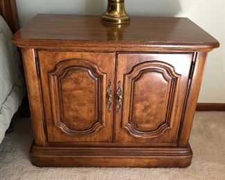 Closer look at one of two matching Thomasville burl wood nightstands.