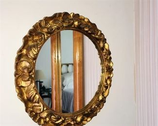 Gold round mirror
