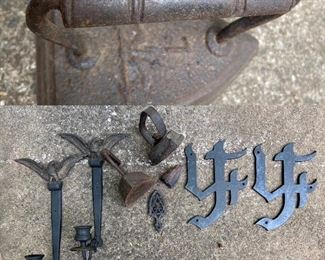 Cast Iron Irons
Cast Iron Candle Scounces
Cast Iron Emblems