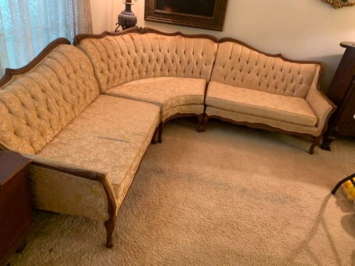 #1	Gold Fabric Corner Vintage Sofa (as is fabric) w/wood arms and legs/Trim  w/button Back made by Union Brothers  Sectional 3 pcs.   2-47" Ends, corner pc 5' Long  81x81 overall	 $75.00 
