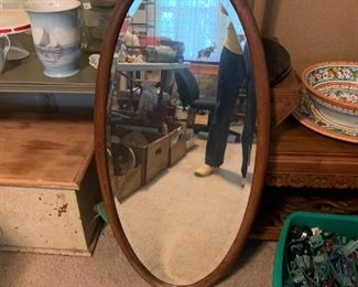 #128	Oval Wood Framed Beveled Mirror  20wx42T	 $45.00 
