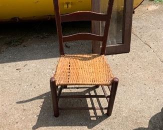 #321	odd chair with basket weave seat 	 $30.00 
